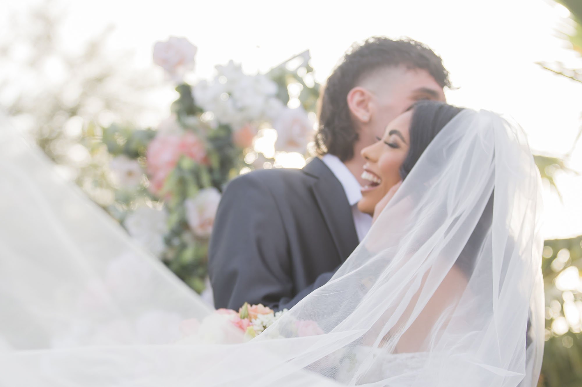 Newlyweds dance and laugh while outside at their las vegas country club wedding